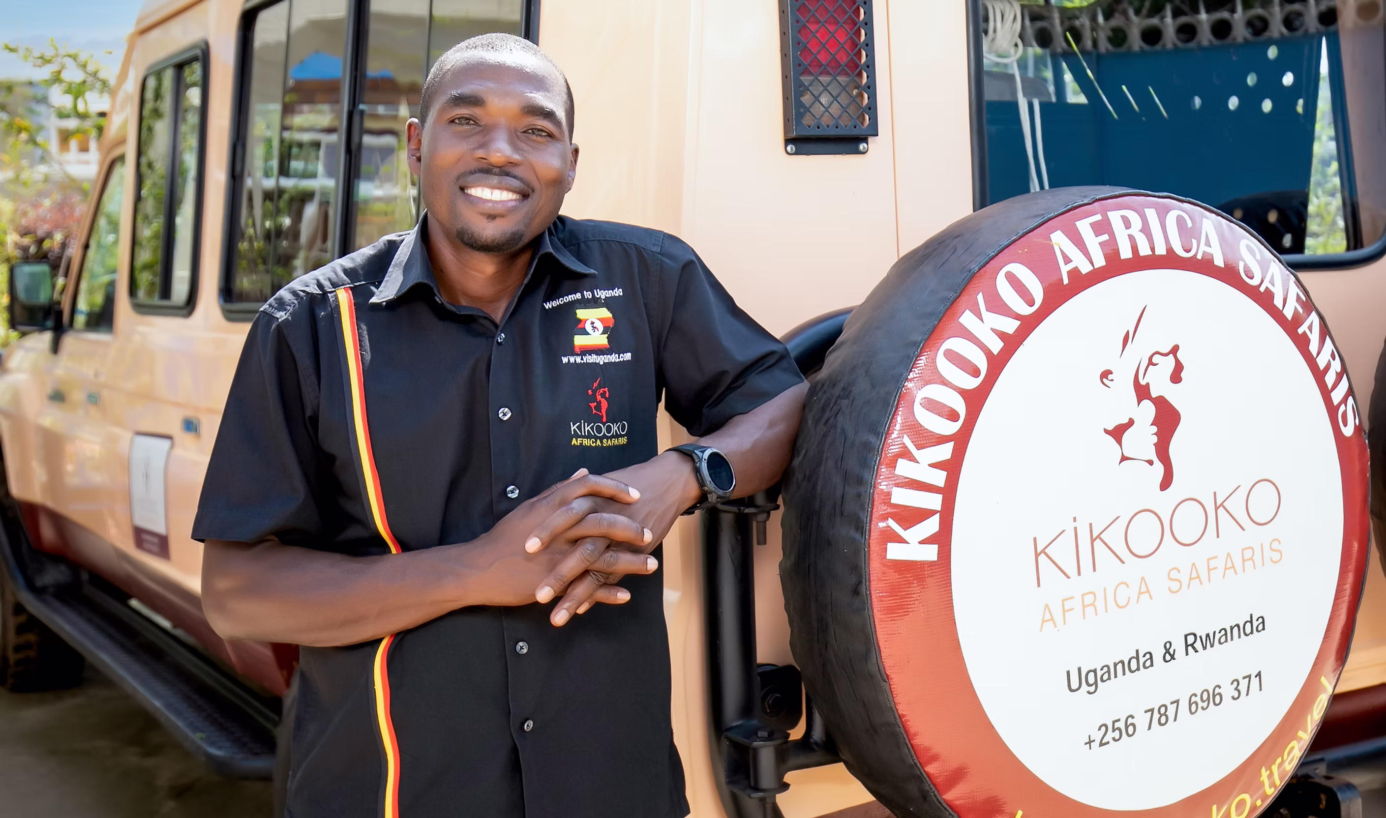 Warren Rutanga Ankwasa with Kikooko Africa Safaris vehicle